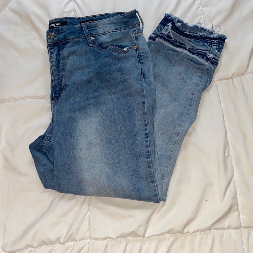 distressed skinny blue jeans